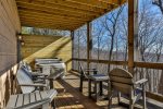 Lower level balcony with hottub and privacy fence